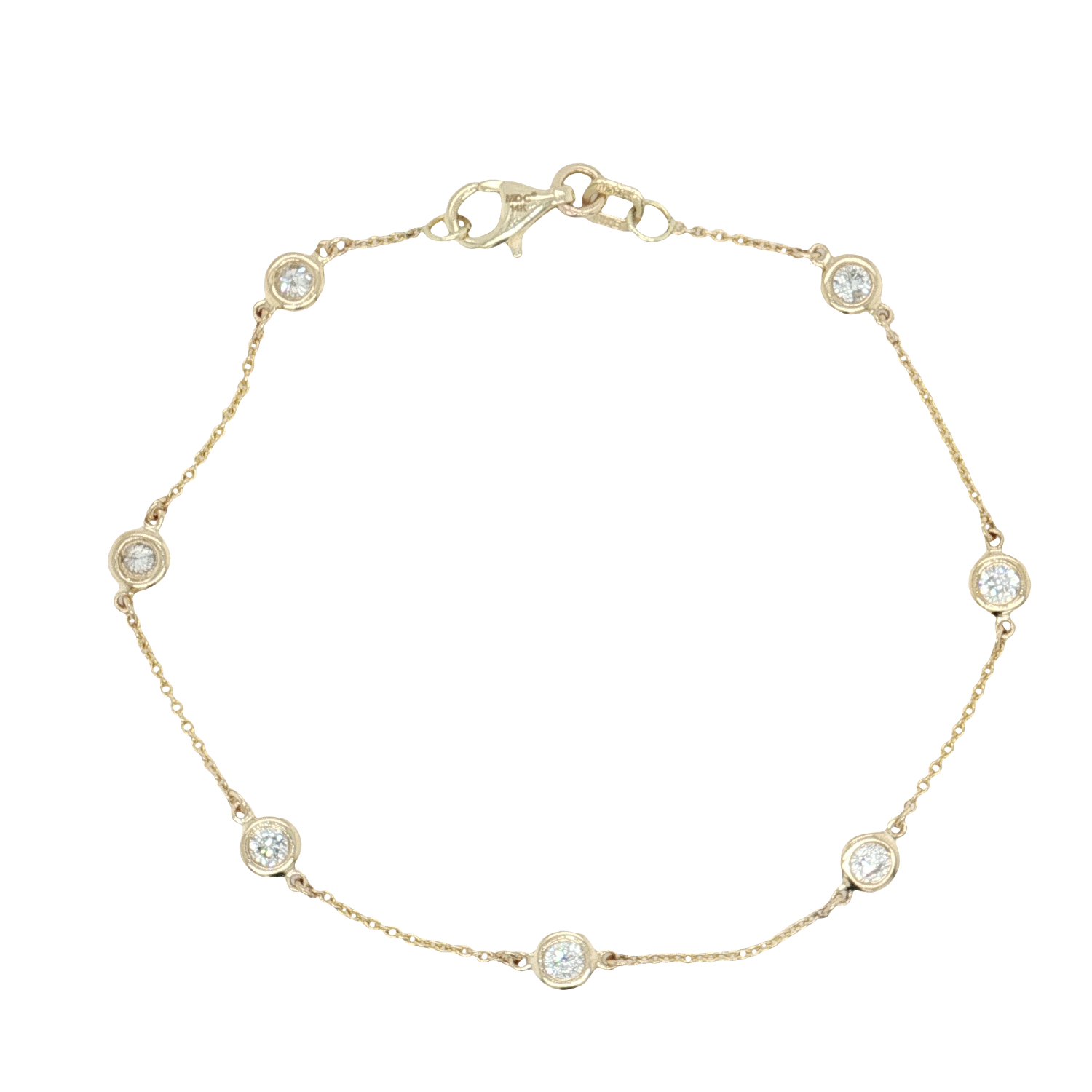 A delicate yellow gold chain bracelet with five bezel-set round clear gemstones, displayed on a clean white background.