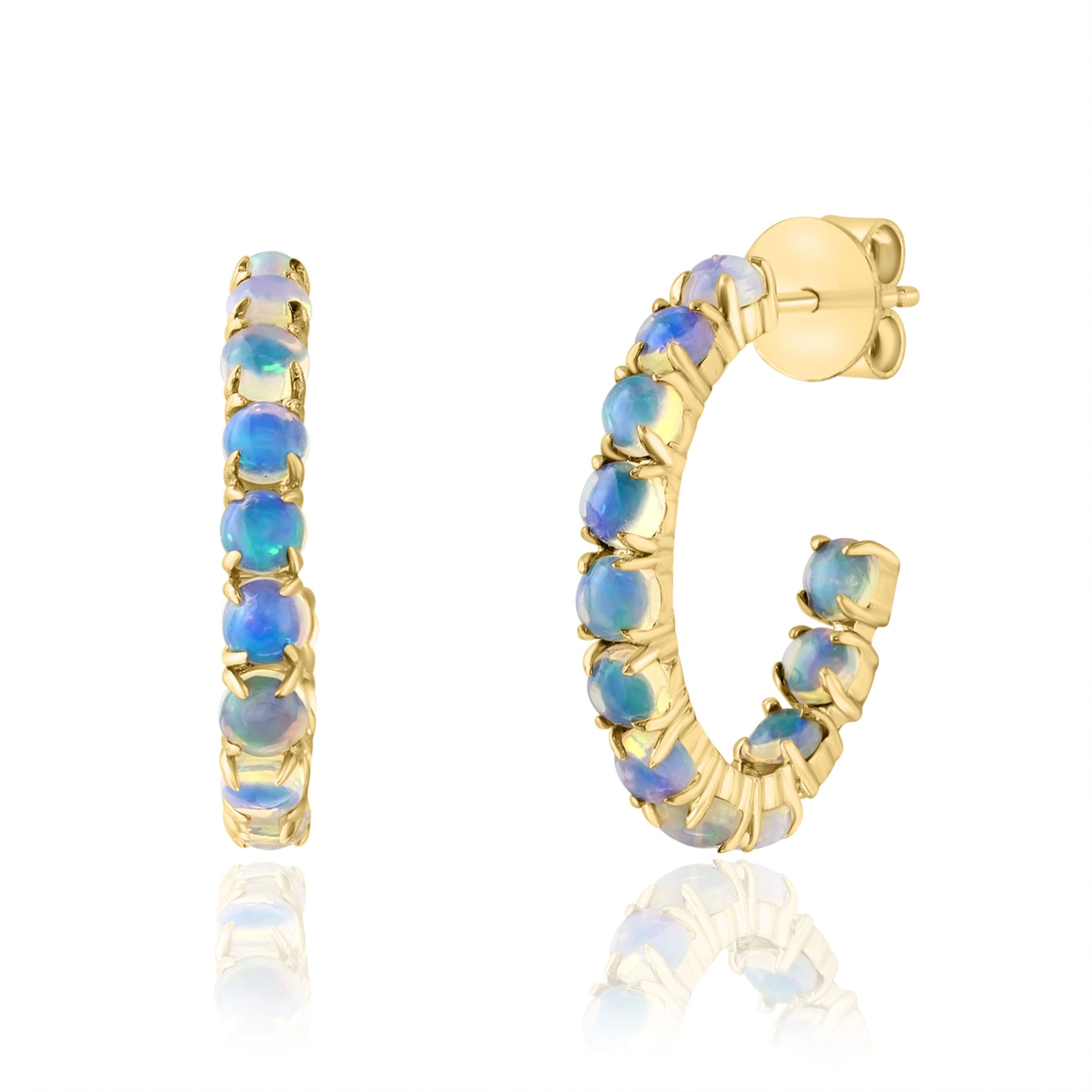 A pair of gold hoop earrings with inlaid blue opal stones, shown on a clean white background with a soft reflection below.